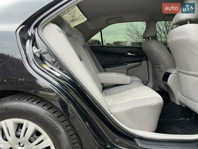 Чорний Тойота Камрі, об'ємом двигуна 2.49 л та пробігом 199 тис. км за 10999 $, фото 45 на Automoto.ua