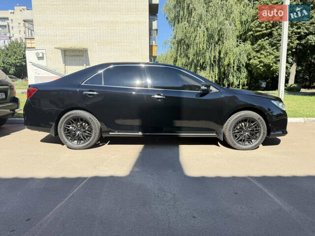 Черный Тойота Камри, объемом двигателя 2.49 л и пробегом 164 тыс. км за 14000 $, фото 4 на Automoto.ua