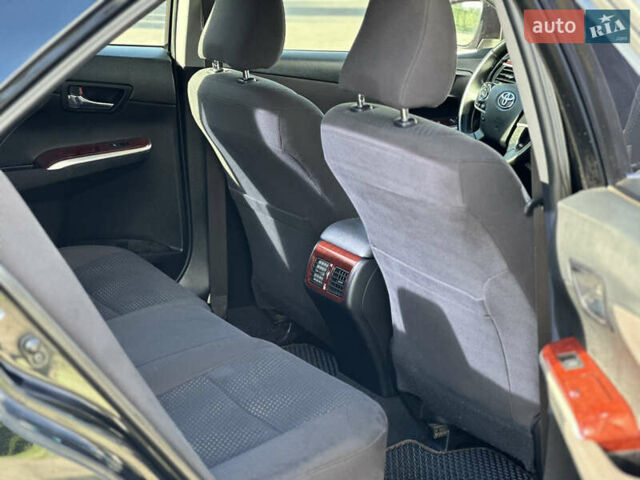 Черный Тойота Камри, объемом двигателя 2.5 л и пробегом 175 тыс. км за 9850 $, фото 21 на Automoto.ua