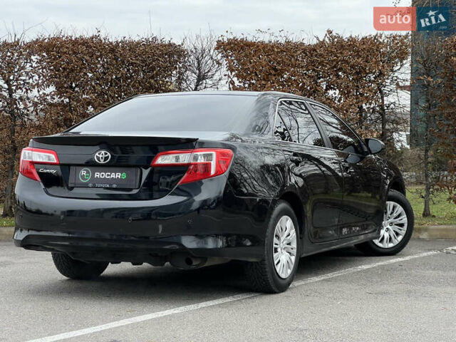 Чорний Тойота Камрі, об'ємом двигуна 2.49 л та пробігом 199 тис. км за 10999 $, фото 20 на Automoto.ua