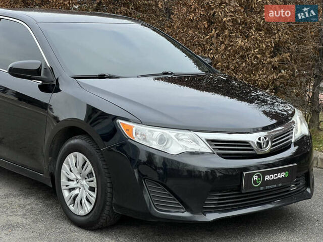 Чорний Тойота Камрі, об'ємом двигуна 2.49 л та пробігом 199 тис. км за 10999 $, фото 26 на Automoto.ua