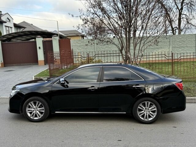 Черный Тойота Камри, объемом двигателя 2.5 л и пробегом 185 тыс. км за 12000 $, фото 4 на Automoto.ua
