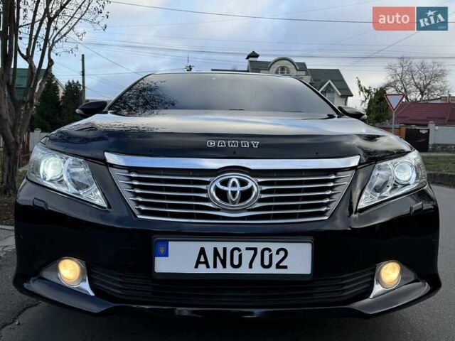 Чорний Тойота Камрі, об'ємом двигуна 2.49 л та пробігом 185 тис. км за 12000 $, фото 5 на Automoto.ua