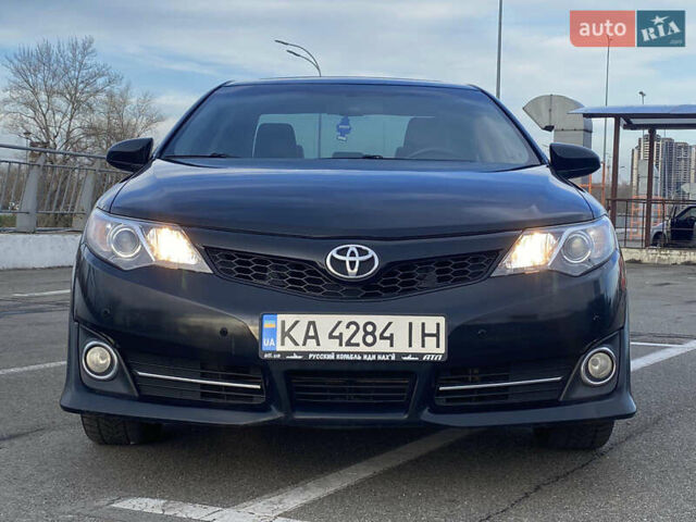Черный Тойота Камри, объемом двигателя 2.5 л и пробегом 280 тыс. км за 12500 $, фото 18 на Automoto.ua