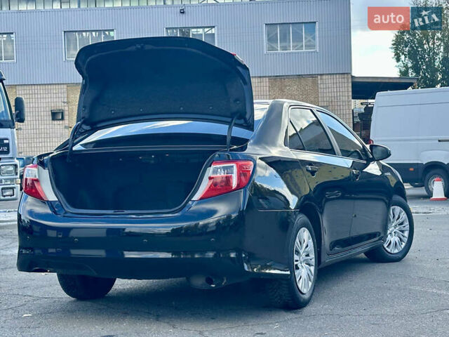 Черный Тойота Камри, объемом двигателя 2.49 л и пробегом 240 тыс. км за 11600 $, фото 17 на Automoto.ua