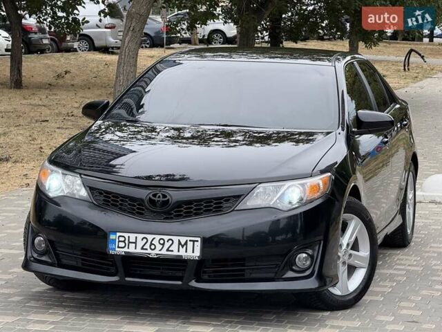 Черный Тойота Камри, объемом двигателя 2.5 л и пробегом 196 тыс. км за 13600 $, фото 18 на Automoto.ua