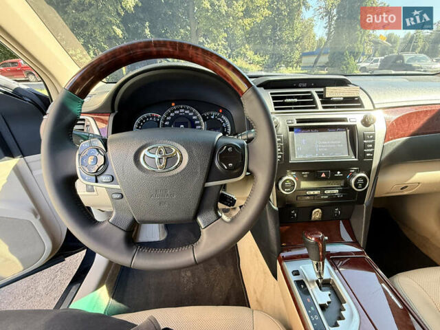 Черный Тойота Камри, объемом двигателя 2.49 л и пробегом 164 тыс. км за 14000 $, фото 8 на Automoto.ua