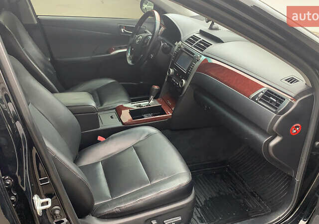 Чорний Тойота Камрі, об'ємом двигуна 2.5 л та пробігом 124 тис. км за 14700 $, фото 4 на Automoto.ua