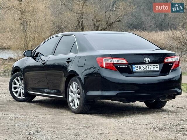 Чорний Тойота Камрі, об'ємом двигуна 2.5 л та пробігом 153 тис. км за 12800 $, фото 2 на Automoto.ua