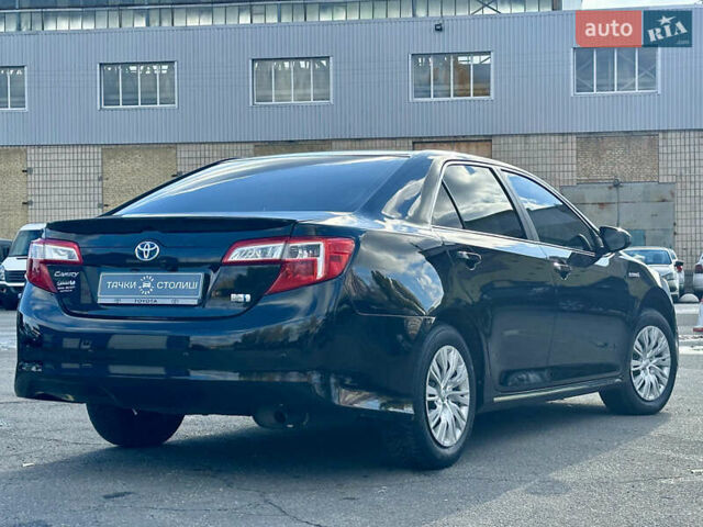 Черный Тойота Камри, объемом двигателя 2.49 л и пробегом 240 тыс. км за 11600 $, фото 2 на Automoto.ua