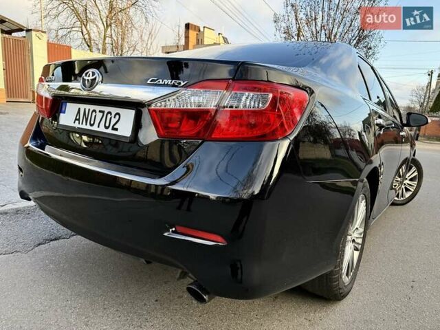 Чорний Тойота Камрі, об'ємом двигуна 2.49 л та пробігом 185 тис. км за 12000 $, фото 24 на Automoto.ua