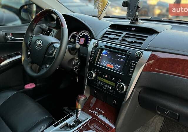 Черный Тойота Камри, объемом двигателя 2.5 л и пробегом 235 тыс. км за 16500 $, фото 22 на Automoto.ua