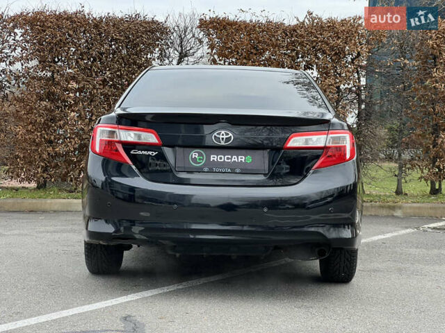 Чорний Тойота Камрі, об'ємом двигуна 2.49 л та пробігом 199 тис. км за 10999 $, фото 14 на Automoto.ua