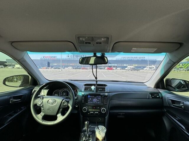 Черный Тойота Камри, объемом двигателя 2.5 л и пробегом 244 тыс. км за 14500 $, фото 14 на Automoto.ua