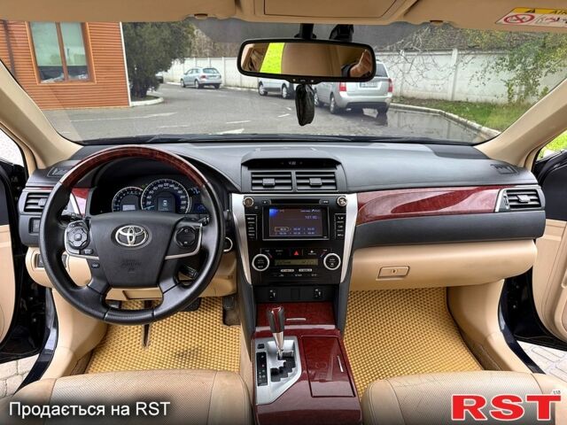 Черный Тойота Камри, объемом двигателя 2.5 л и пробегом 200 тыс. км за 9900 $, фото 7 на Automoto.ua