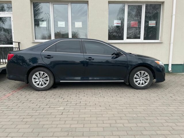 Тойота Камри 2013 в Староконстантинов на Automoto.ua Черный Тойота Камри, объемом двигателя 2.5 л и пробегом 173 тыс. км за 10900 $, фото 10 на Automoto.ua