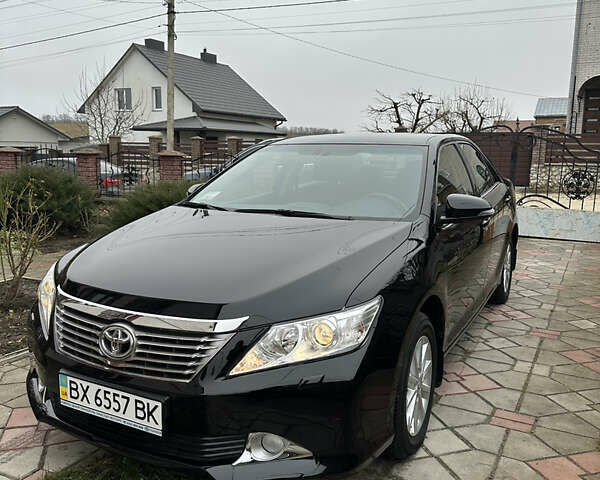 Черный Тойота Камри, объемом двигателя 2.5 л и пробегом 10 тыс. км за 21200 $, фото 1 на Automoto.ua