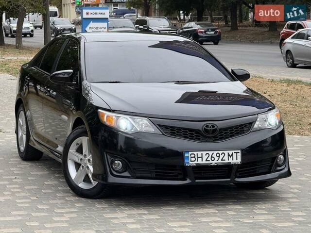 Черный Тойота Камри, объемом двигателя 2.5 л и пробегом 196 тыс. км за 13600 $, фото 19 на Automoto.ua