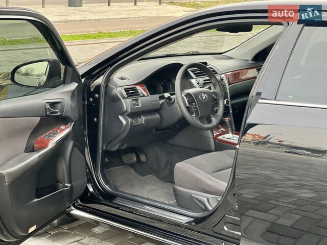 Черный Тойота Камри, объемом двигателя 2.49 л и пробегом 175 тыс. км за 12800 $, фото 27 на Automoto.ua