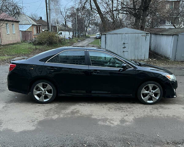 Чорний Тойота Камрі, об'ємом двигуна 2.49 л та пробігом 179 тис. км за 10900 $, фото 2 на Automoto.ua