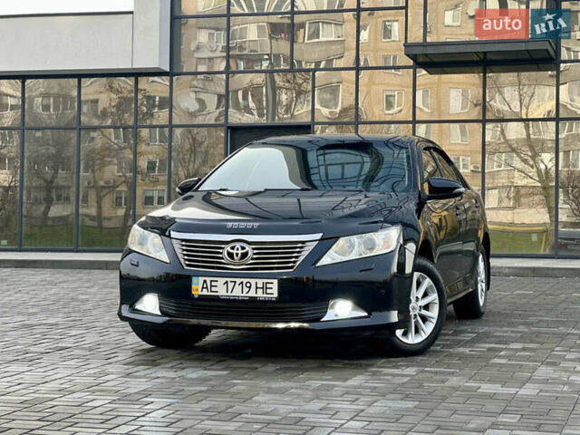 Черный Тойота Камри, объемом двигателя 2.49 л и пробегом 175 тыс. км за 12800 $, фото 2 на Automoto.ua