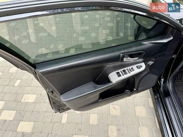 Черный Тойота Камри, объемом двигателя 2.5 л и пробегом 196 тыс. км за 13600 $, фото 32 на Automoto.ua