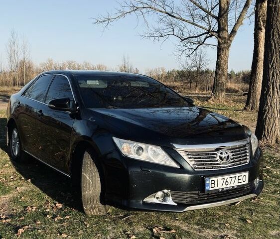 Черный Тойота Камри, объемом двигателя 2.5 л и пробегом 280 тыс. км за 12100 $, фото 7 на Automoto.ua