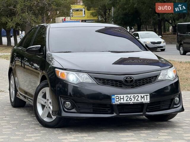 Черный Тойота Камри, объемом двигателя 2.5 л и пробегом 196 тыс. км за 13600 $, фото 23 на Automoto.ua