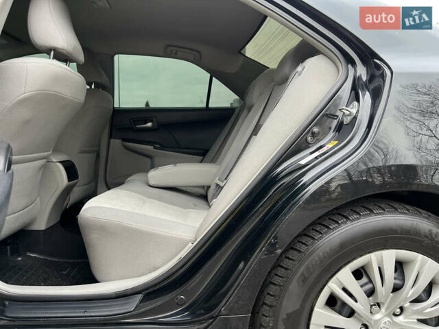 Чорний Тойота Камрі, об'ємом двигуна 2.49 л та пробігом 199 тис. км за 10999 $, фото 42 на Automoto.ua