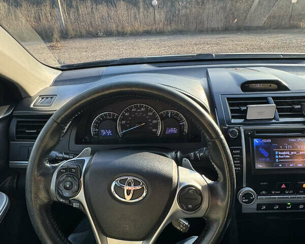 Черный Тойота Камри, объемом двигателя 2.49 л и пробегом 315 тыс. км за 12500 $, фото 1 на Automoto.ua