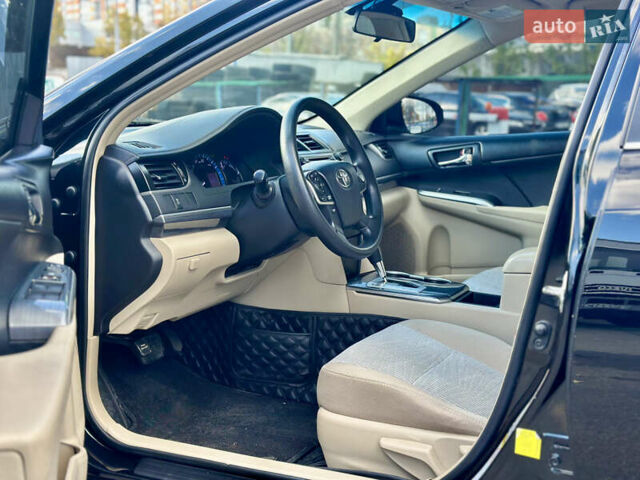 Черный Тойота Камри, объемом двигателя 2.49 л и пробегом 240 тыс. км за 11600 $, фото 8 на Automoto.ua