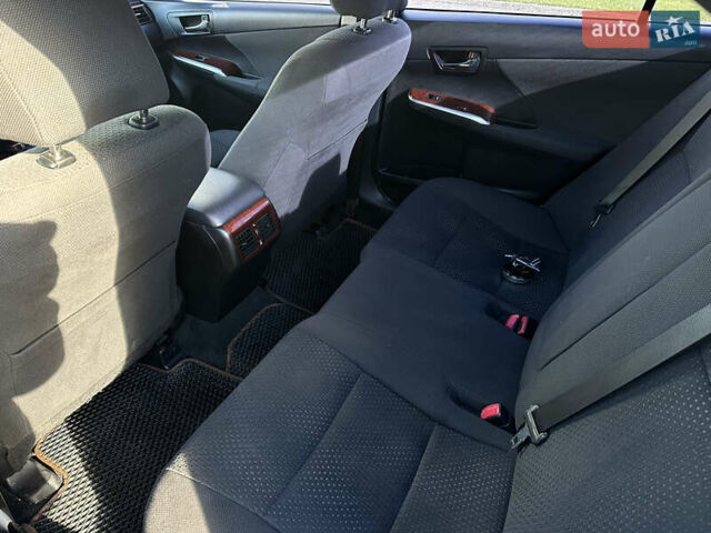 Черный Тойота Камри, объемом двигателя 2.5 л и пробегом 175 тыс. км за 9850 $, фото 16 на Automoto.ua