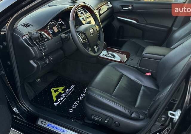 Черный Тойота Камри, объемом двигателя 2.5 л и пробегом 235 тыс. км за 16500 $, фото 14 на Automoto.ua