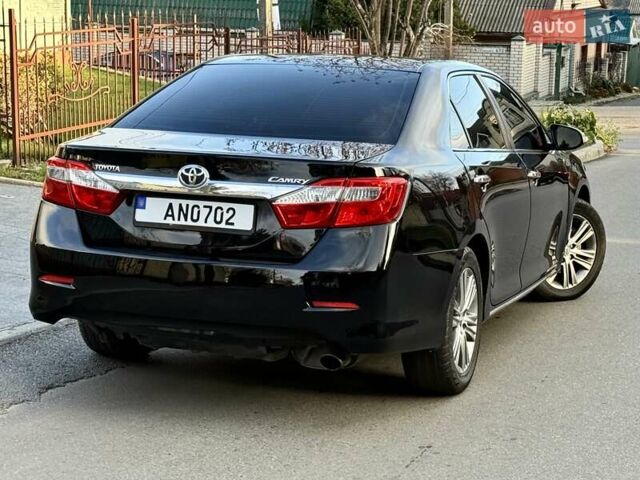 Чорний Тойота Камрі, об'ємом двигуна 2.49 л та пробігом 185 тис. км за 12000 $, фото 20 на Automoto.ua