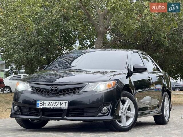 Черный Тойота Камри, объемом двигателя 2.5 л и пробегом 196 тыс. км за 13600 $, фото 14 на Automoto.ua