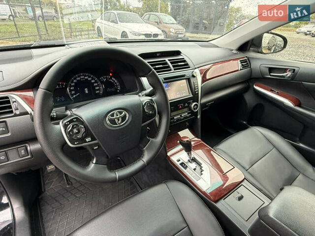 Тойота Камри 2013 в Умани на Automoto.ua Черный Тойота Камри, объемом двигателя 2.5 л и пробегом 244 тыс. км за 12450 $, фото 12 на Automoto.ua