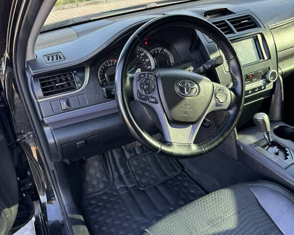 Черный Тойота Камри, объемом двигателя 2.49 л и пробегом 142 тыс. км за 13200 $, фото 22 на Automoto.ua