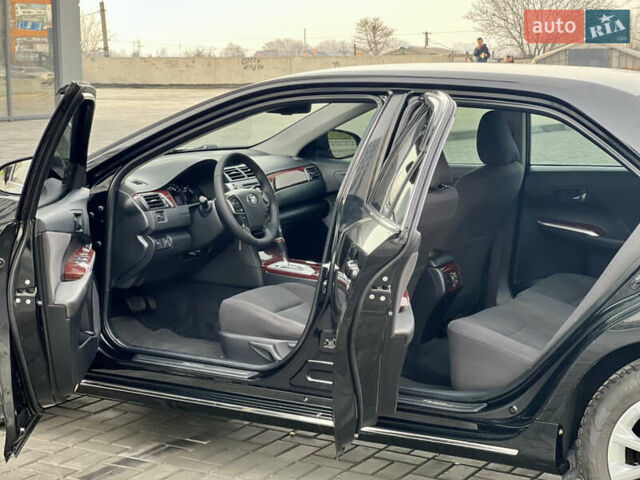 Черный Тойота Камри, объемом двигателя 2.49 л и пробегом 175 тыс. км за 12800 $, фото 26 на Automoto.ua