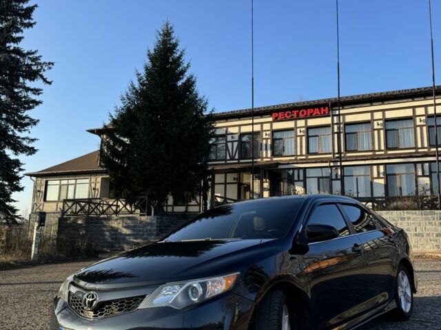 Чорний Тойота Камрі, об'ємом двигуна 2.5 л та пробігом 310 тис. км за 12600 $, фото 1 на Automoto.ua