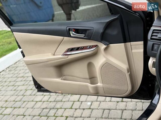 Черный Тойота Камри, объемом двигателя 2.49 л и пробегом 200 тыс. км за 10000 $, фото 48 на Automoto.ua