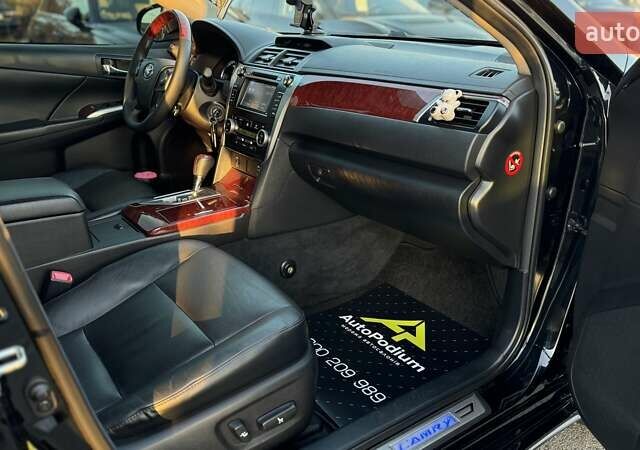 Черный Тойота Камри, объемом двигателя 2.5 л и пробегом 235 тыс. км за 16500 $, фото 20 на Automoto.ua