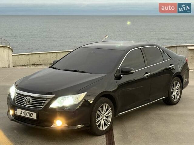 Черный Тойота Камри, объемом двигателя 2.49 л и пробегом 200 тыс. км за 10000 $, фото 3 на Automoto.ua