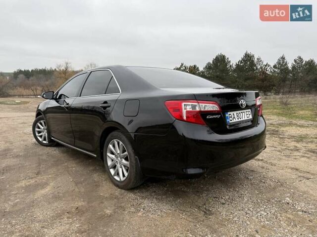 Чорний Тойота Камрі, об'ємом двигуна 2.5 л та пробігом 153 тис. км за 12800 $, фото 4 на Automoto.ua