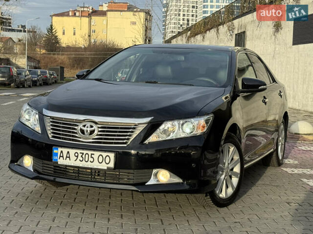 Чорний Тойота Камрі, об'ємом двигуна 2.5 л та пробігом 208 тис. км за 13700 $, фото 1 на Automoto.ua