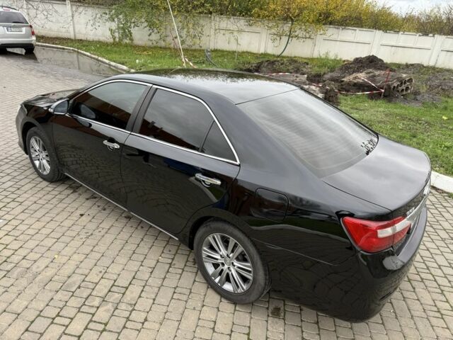 Черный Тойота Камри, объемом двигателя 2.5 л и пробегом 200 тыс. км за 9900 $, фото 8 на Automoto.ua