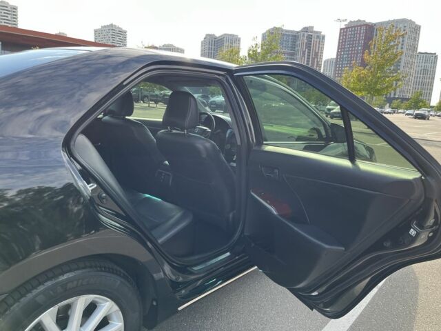 Черный Тойота Камри, объемом двигателя 2.5 л и пробегом 206 тыс. км за 12100 $, фото 18 на Automoto.ua