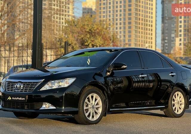 Черный Тойота Камри, объемом двигателя 2.5 л и пробегом 235 тыс. км за 16500 $, фото 2 на Automoto.ua