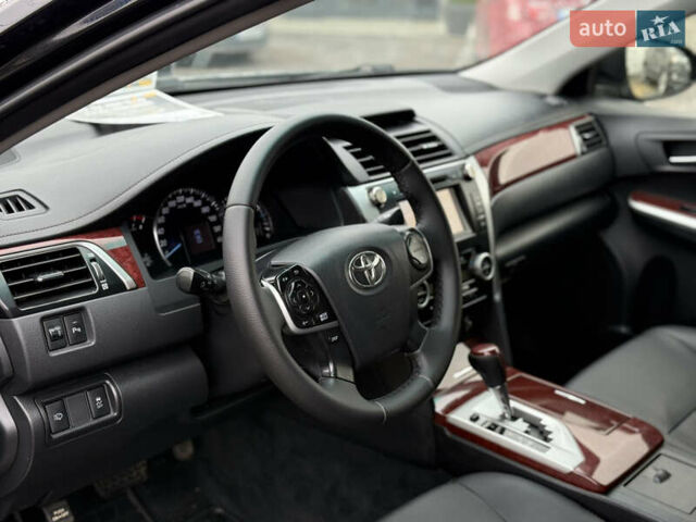 Тойота Камри 2013 в Умани на Automoto.ua Черный Тойота Камри, объемом двигателя 2.5 л и пробегом 244 тыс. км за 12450 $, фото 9 на Automoto.ua