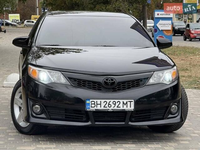 Черный Тойота Камри, объемом двигателя 2.5 л и пробегом 196 тыс. км за 13600 $, фото 21 на Automoto.ua