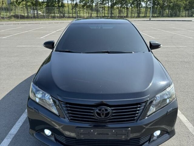 Черный Тойота Камри, объемом двигателя 2.5 л и пробегом 244 тыс. км за 14500 $, фото 2 на Automoto.ua